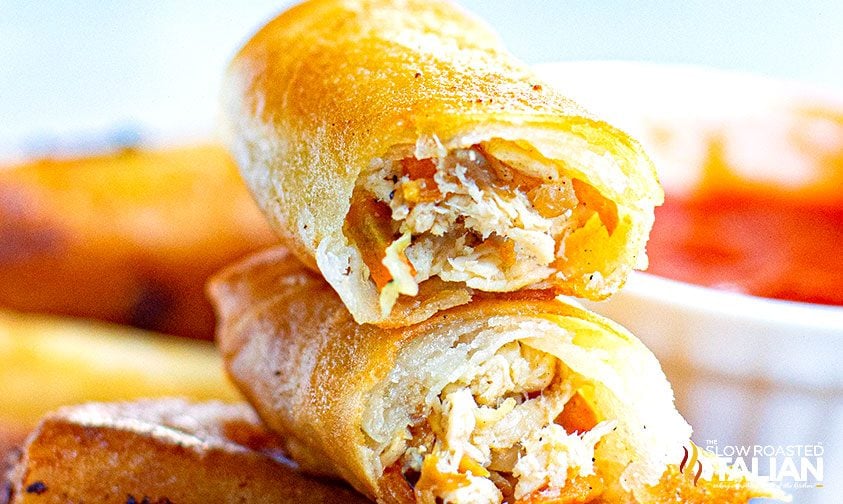 stacked spring rolls with chicken filling, showing inside