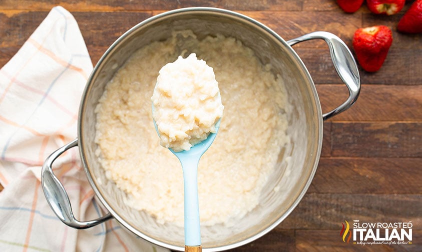 spoon of cooked rice pudding with vanilla