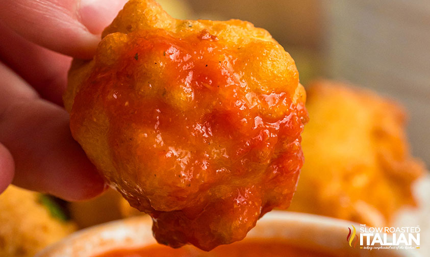 crispy cheese bites dipped in marinara