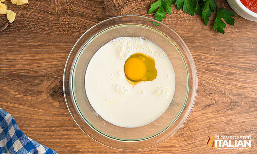 egg and milk in a large mixing bowl