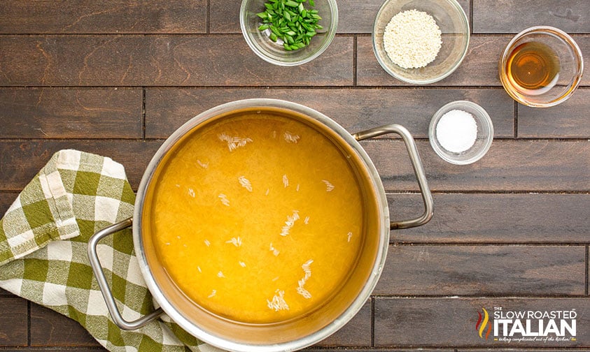 jasmine rice and chicken stock in a large pot