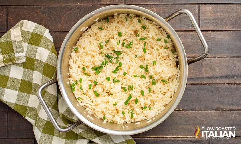 scallions, sesame seeds and salt added to cooked rice