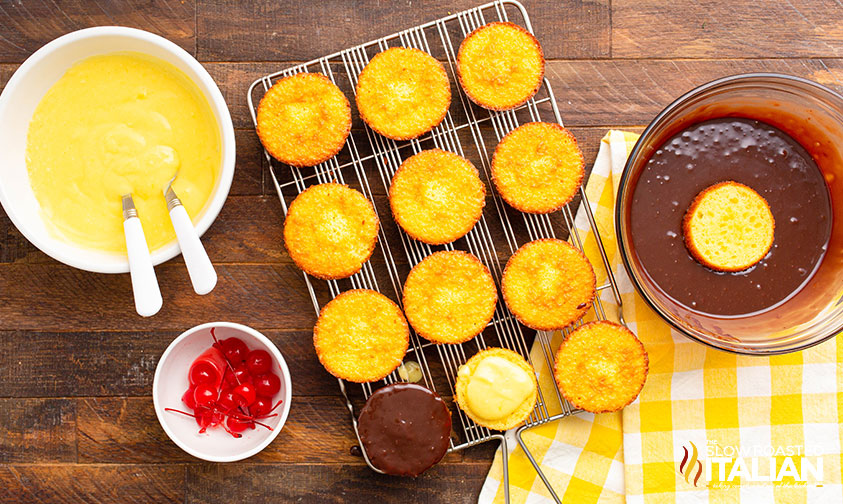 filling boston cream cupcakes and dipping top in chocolate ganache