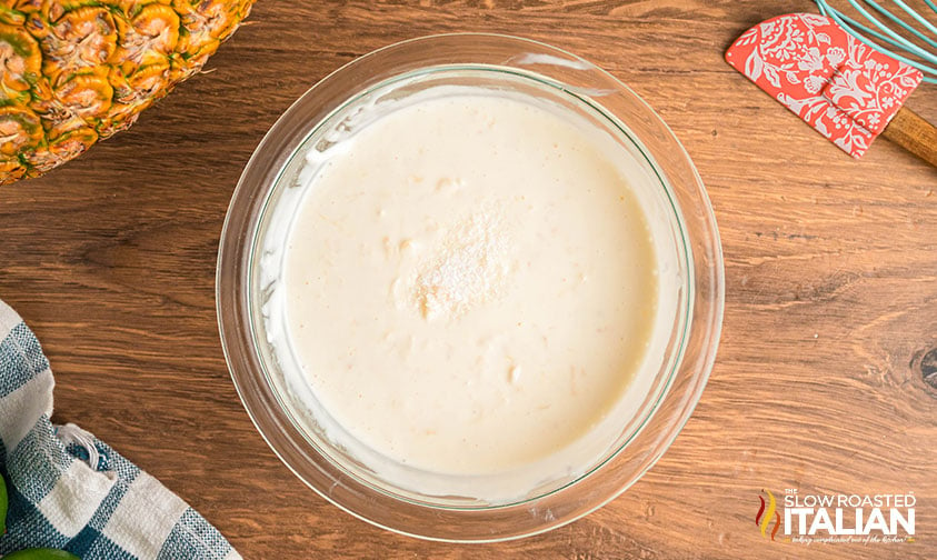 mixed coconut shrimp sauce in a small mixing bowl