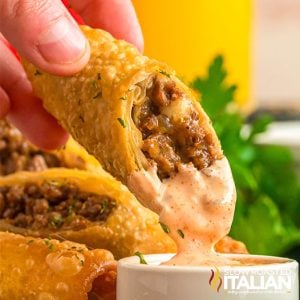 cheesecake factory cheeseburger spring roll dipped in sauce