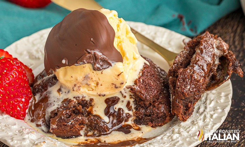 chili's molten lava cake in a bowl with melting vanilla ice cream