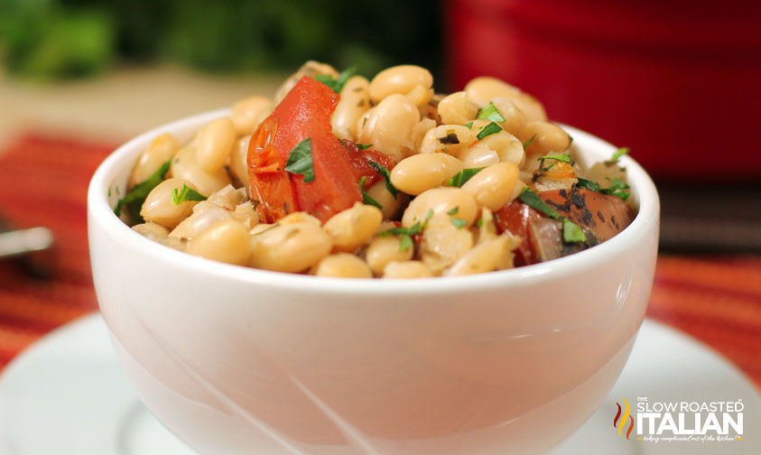 closeup view of italian white beans in a white bowl