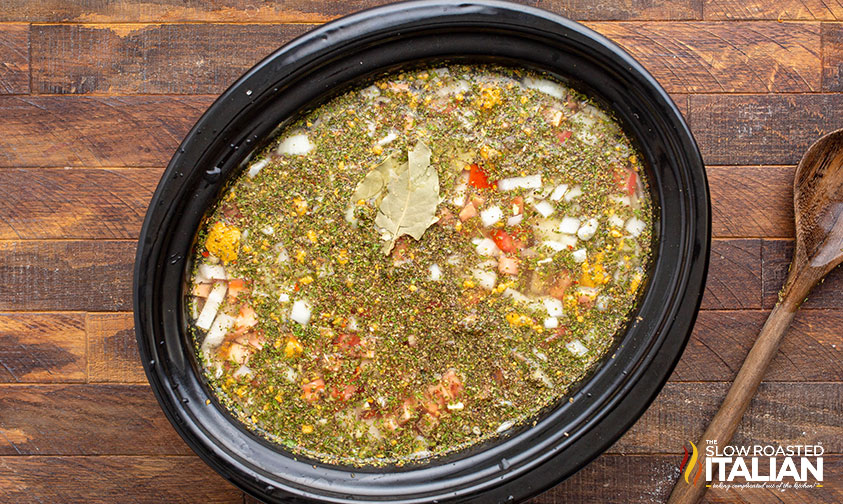 stirred ingredients for italian beans in crockpot recipe