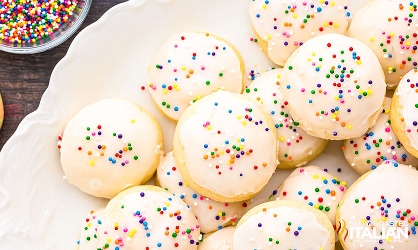 stacked italian wedding cookies on a plate