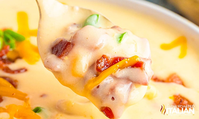 closeup of outback baked potato soup on a spoon