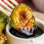 honey balsamic brussel sprots dipped in sauce