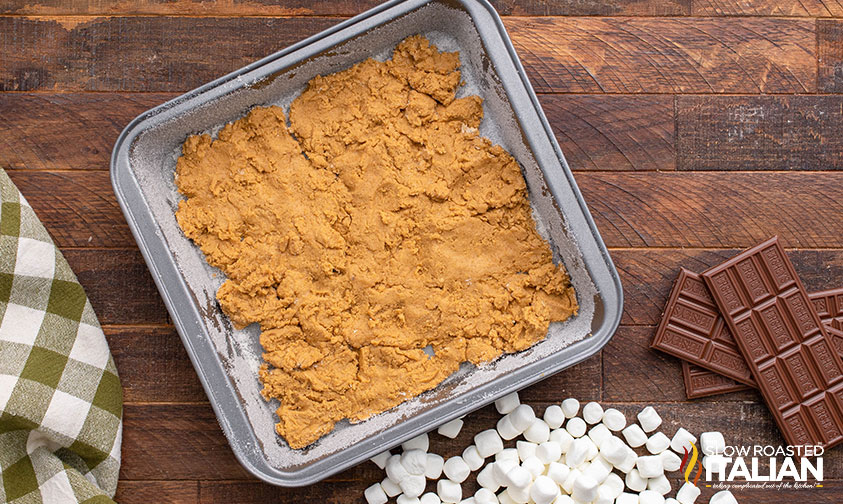 s'more bars dough in baking pan