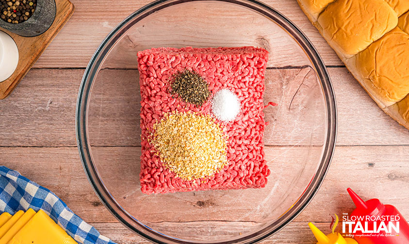 ground beef, minced onion, salt and pepper in a mixing bowl