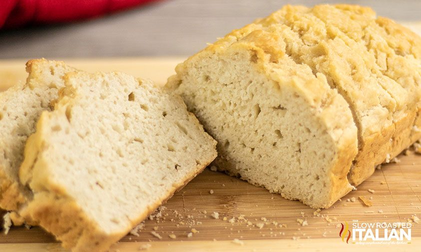 beer bread slices on wooden cutting board