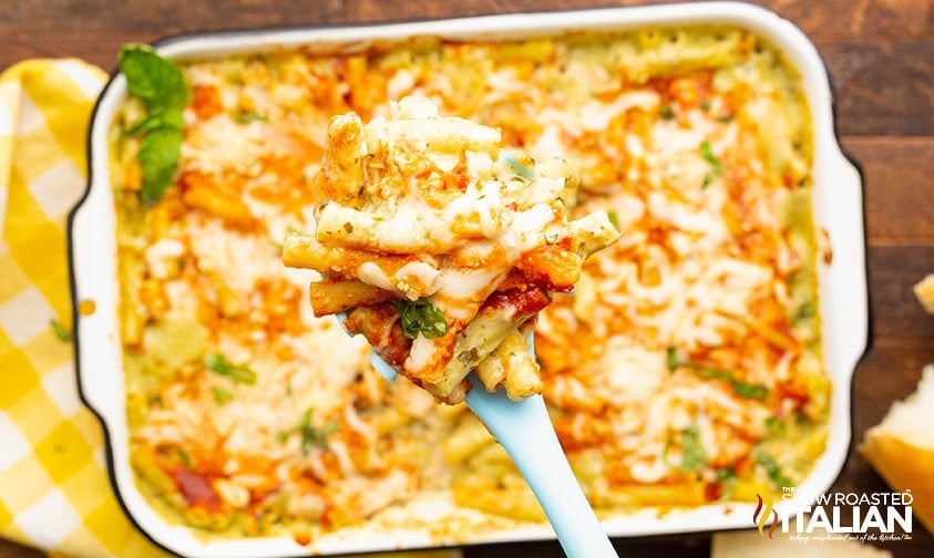 pesto pasta bake in a serving spoon