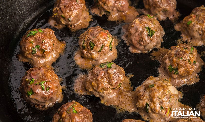 baked meatballs in a cast iron skillet