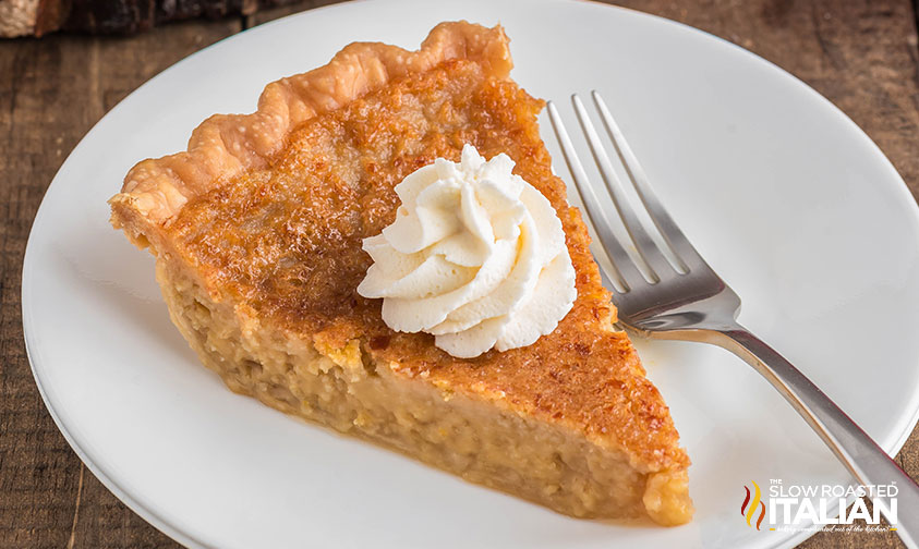 slice of maple pie on a white plate with a fork