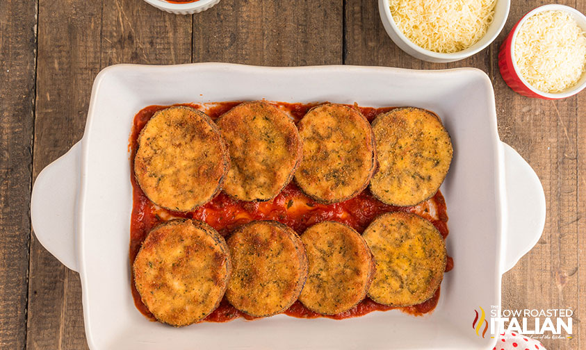 olive garden eggplant parmesan in a baking dish