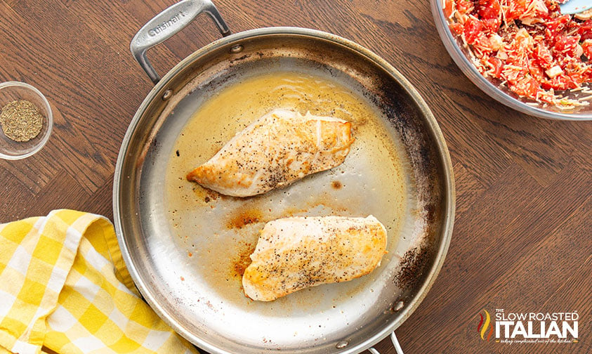 cooking chicken breast in a large skillet