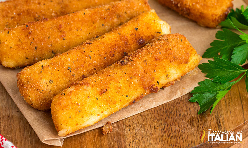 tgi friday's mozzarella sticks on brown parchment paper