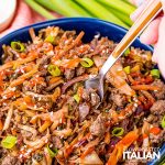 spoon in keto egg roll in a bowl