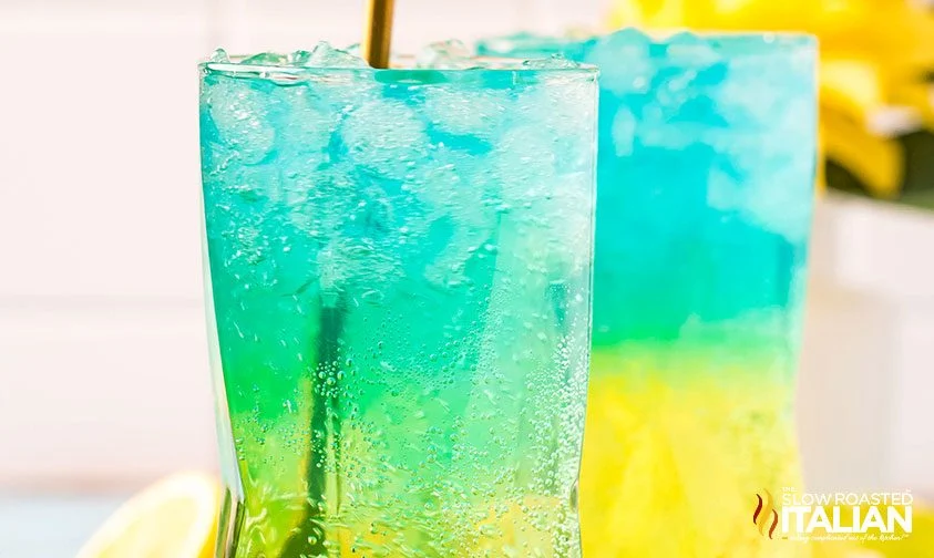 two glasses of Mountain Dew Baja Blast soda pop