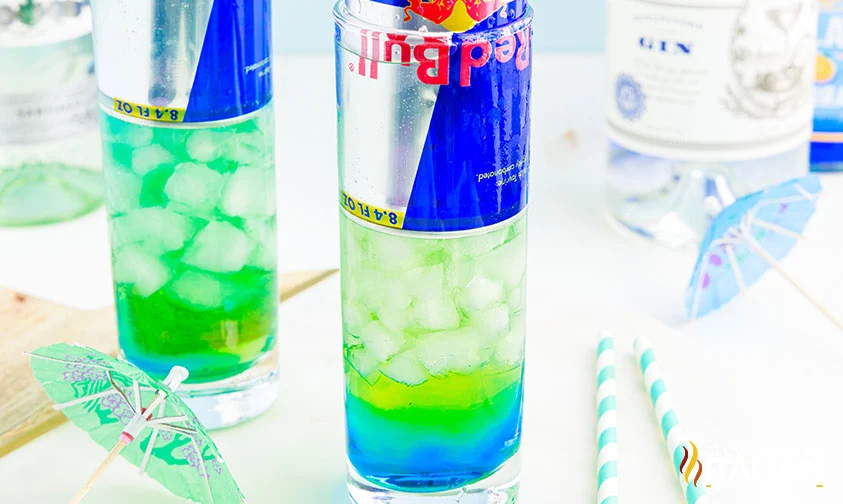 red bull cans upside down in tall glass to make Irish trash can cocktail