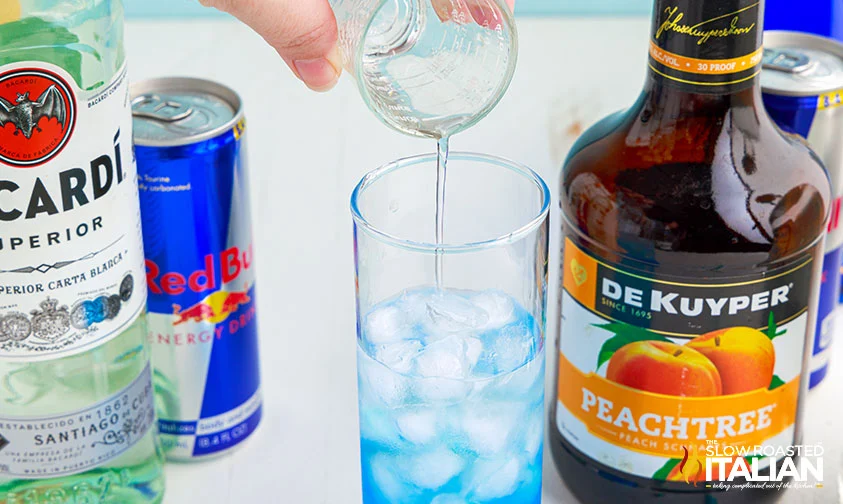 adding peach schnapps to garbage can drink