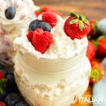 keto cheesecake fluff in jar with fresh berries
