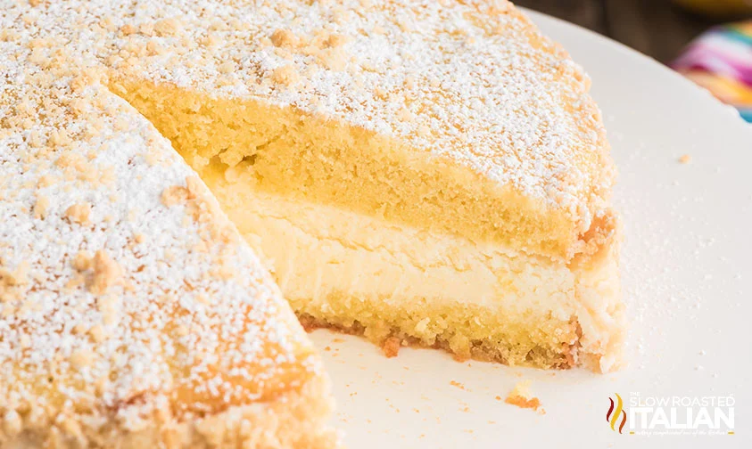 Italian lemon cream cake with slice removed