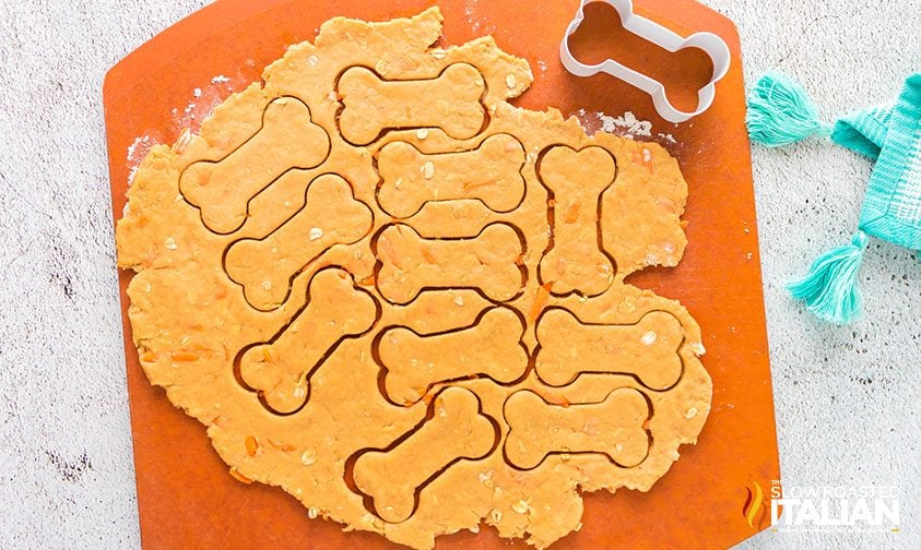 peanut butter dog cookie dough cut into bone shapes