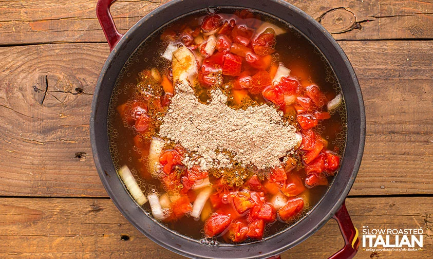 beef stew seasoning added to a pot of poor man's stew
