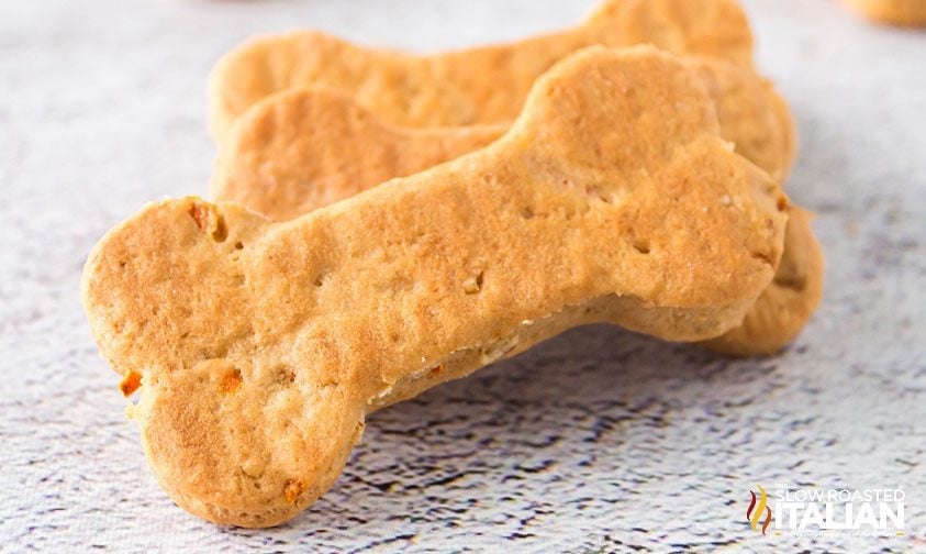 baked peanut butter dog biscuits in the shape of a bone