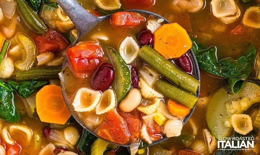 close up: ladle of copycat olive garden minestrone soup