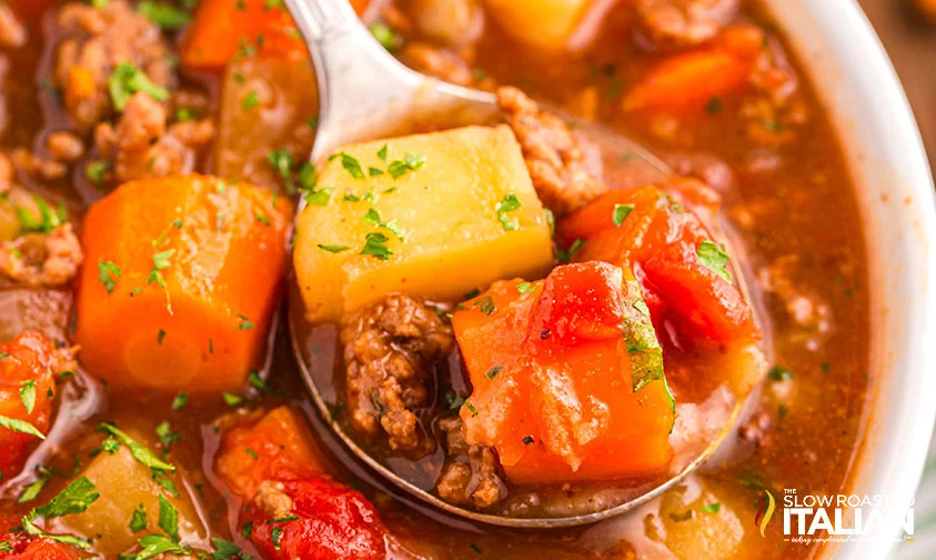 spoonful of hamburger stew in bowl