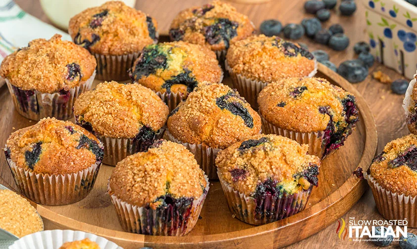 wooden tray of freshly baked starbucks blueberry muffins