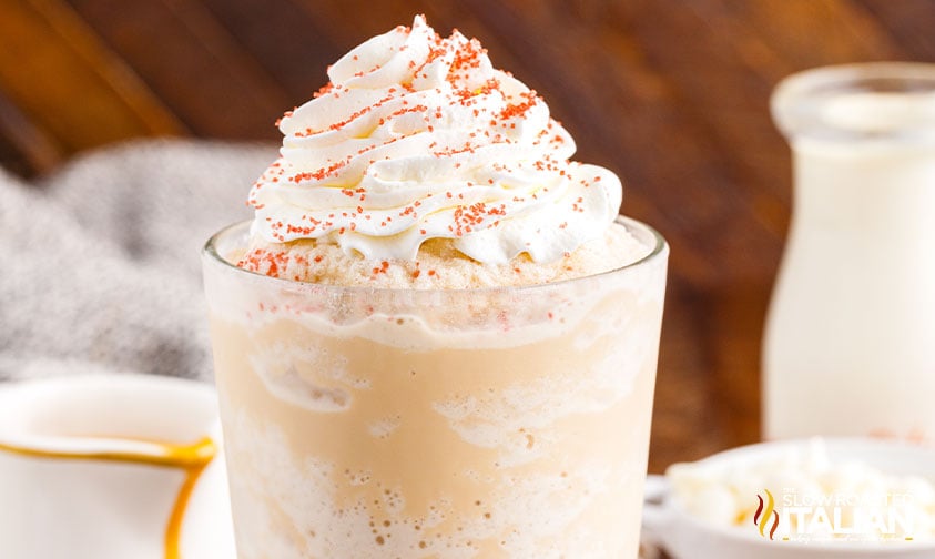 white chocolate mocha frappuccino with whipped cream and red sugar sprinkles