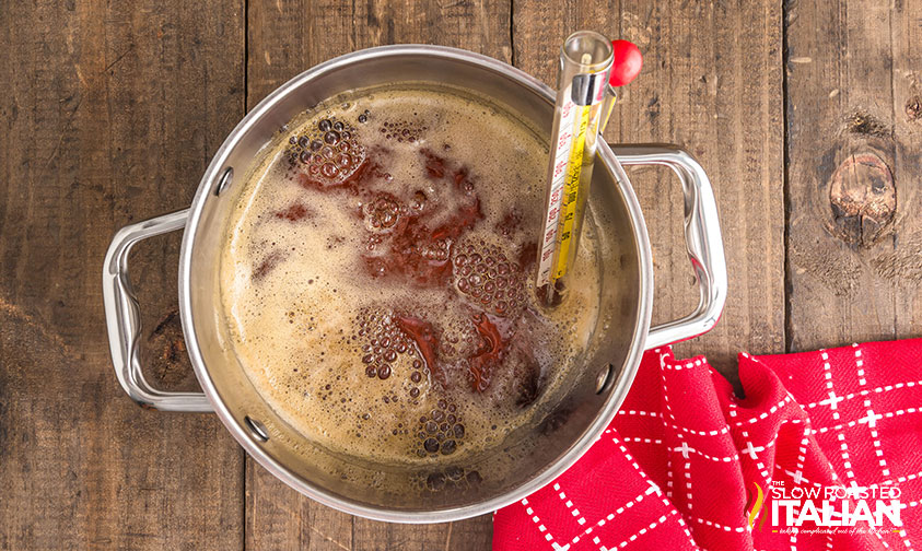 boiling maple syrup in a medium pot