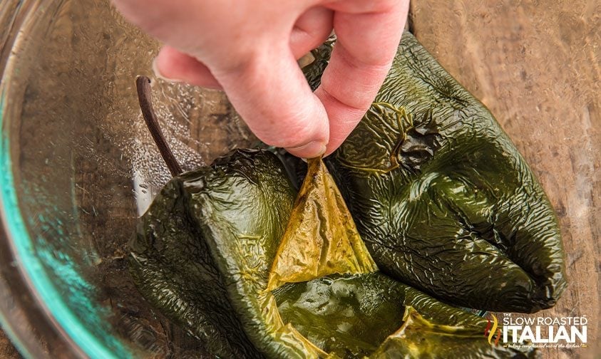 peeling skin off of roasted chiles for corn salsa