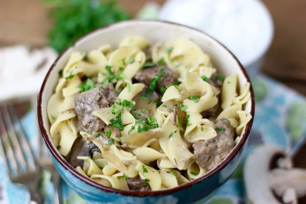 beef stroganoff with noodles in a bowl