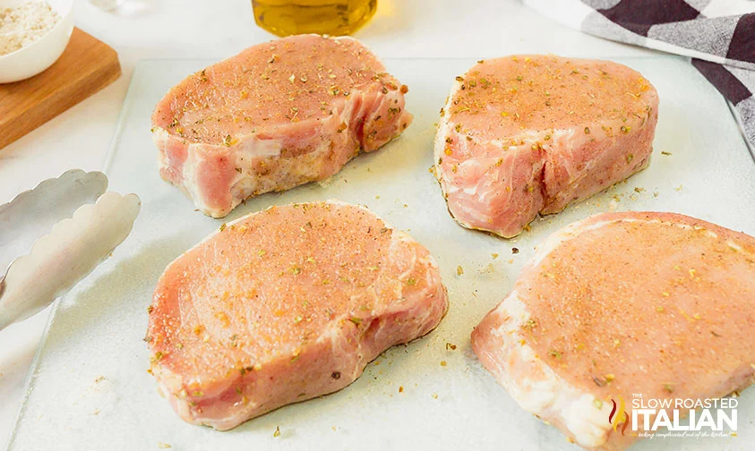 thick-cut boneless pork chops coated in brown sugar and herb rub