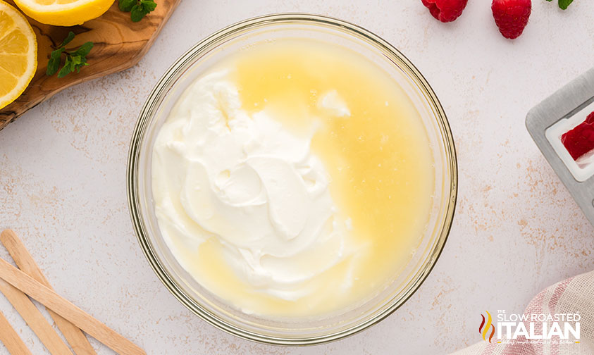 lemon juice and yogurt added to large bowl