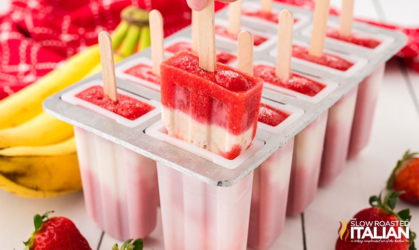 demolding a strawberry banana popsicle