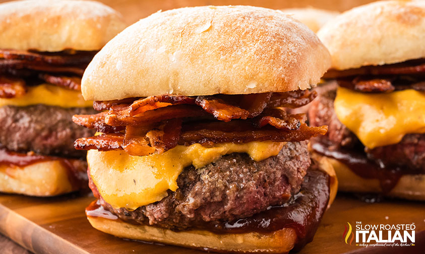 barbecue bacon burgers on a wood board