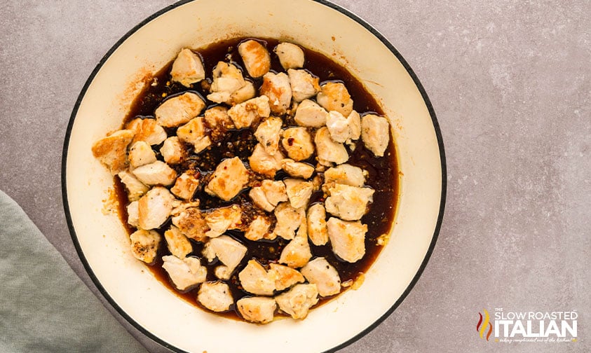 sauce added to cooked chicken pieces