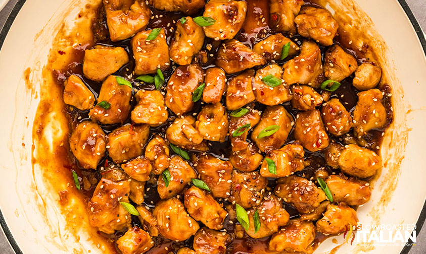 sticky honey garlic chicken bites in a large pot