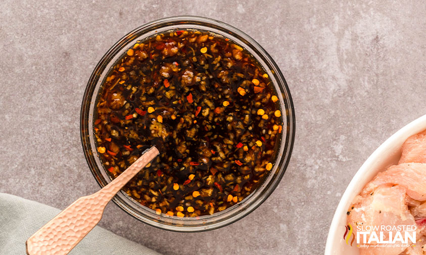 sauce ingredients for honey garlic chicken bites mixed in a small bowl.