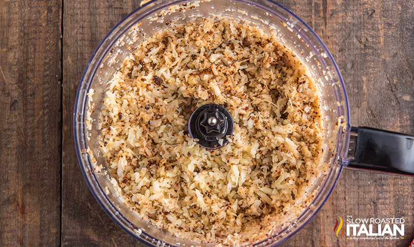 overhead: riced cauliflower in a food processor