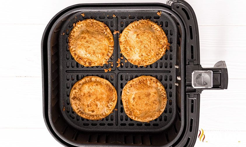 four s'mores hand pies in air fryer basket