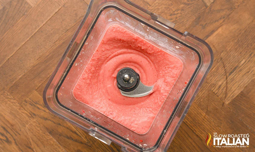 blended strawberry banana smoothie drink in blender